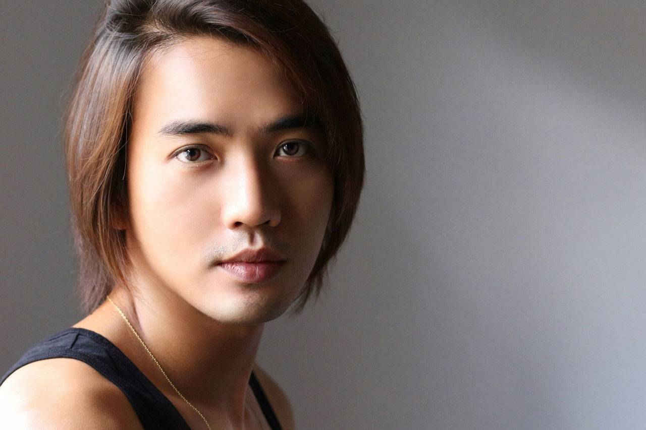 Young Man with Long Hair, Ad for Eye Emergencies